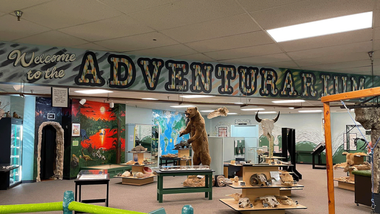 A sign depicting "Welcome to the Adventurarium" at CCSD Adventurarium Science Center in Gillette, Wyoming.